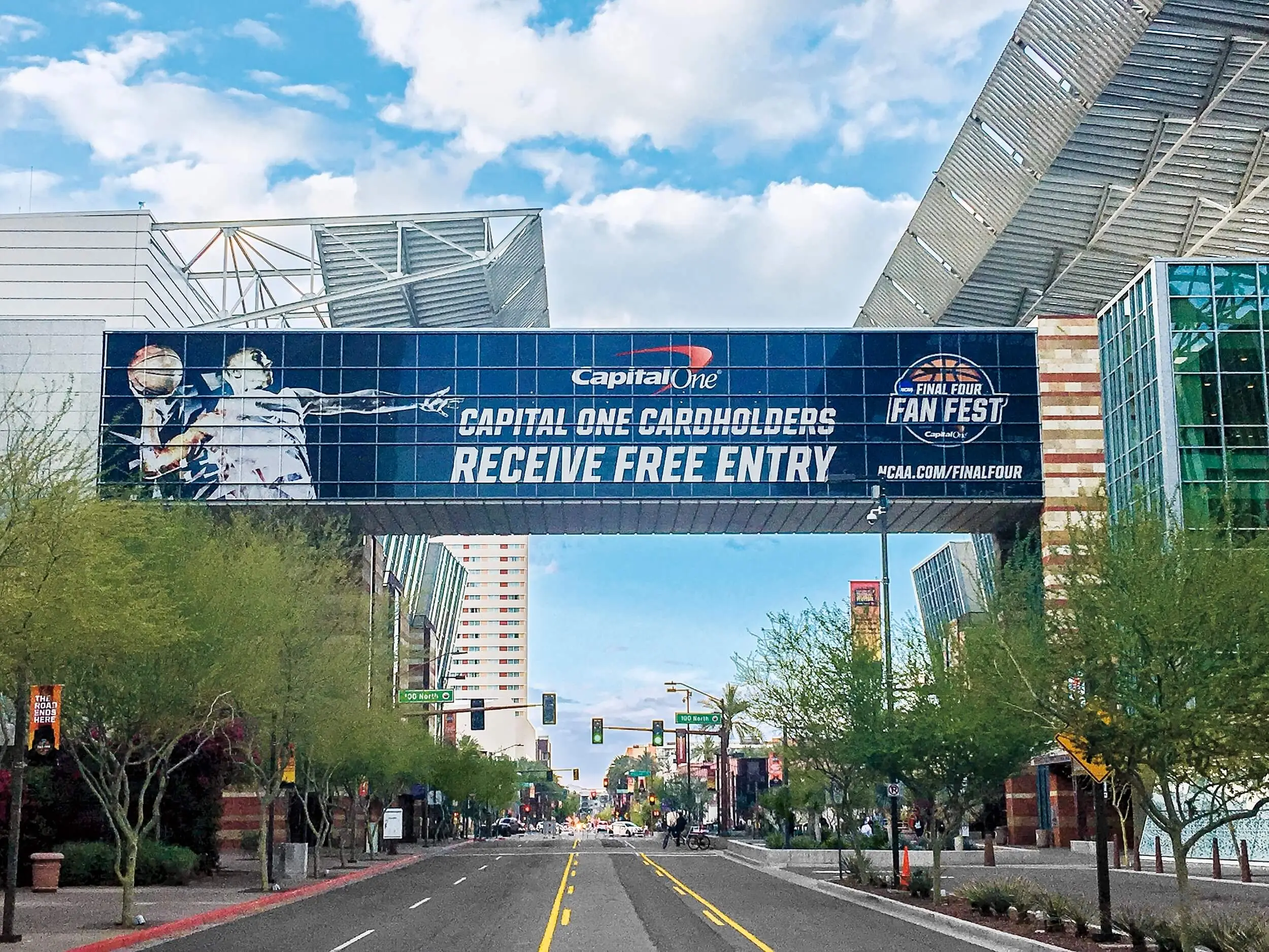 Capital One Fan Fest street banner across a downtown avenue