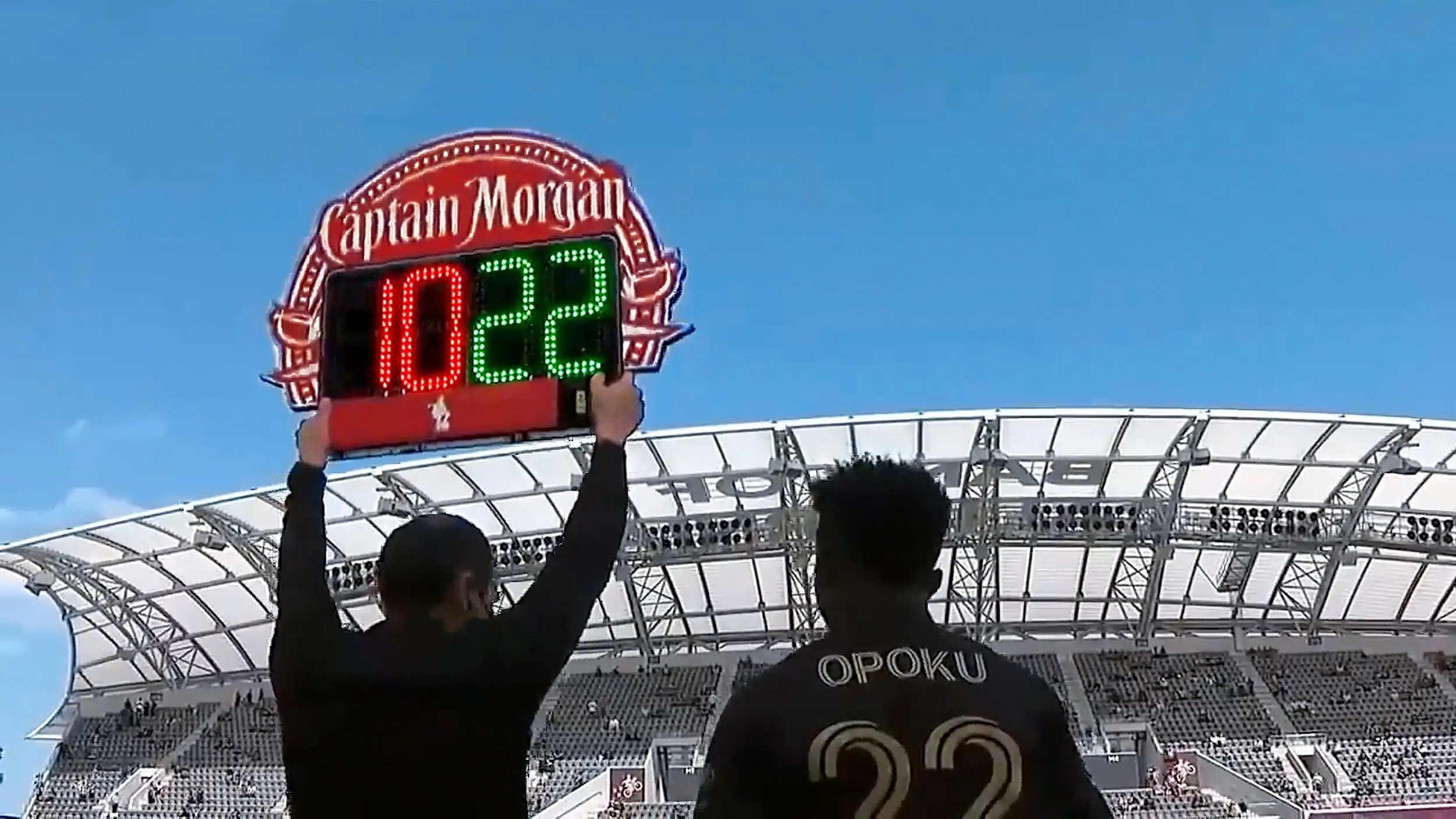 Branded substitution board at a professional soccer match