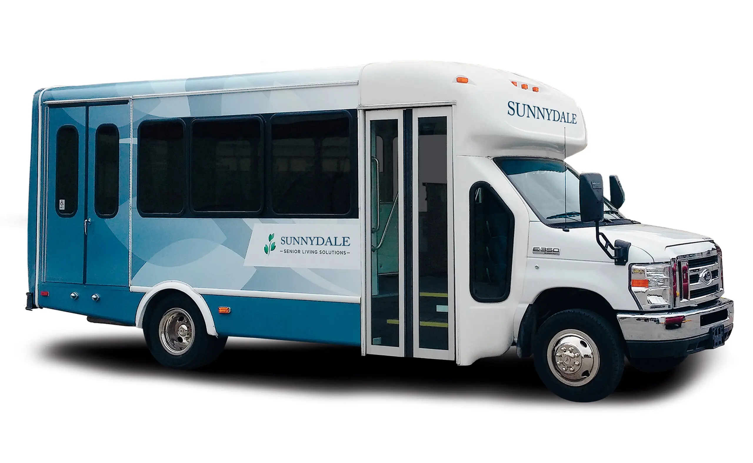 Shuttle bus with blue senior living graphics