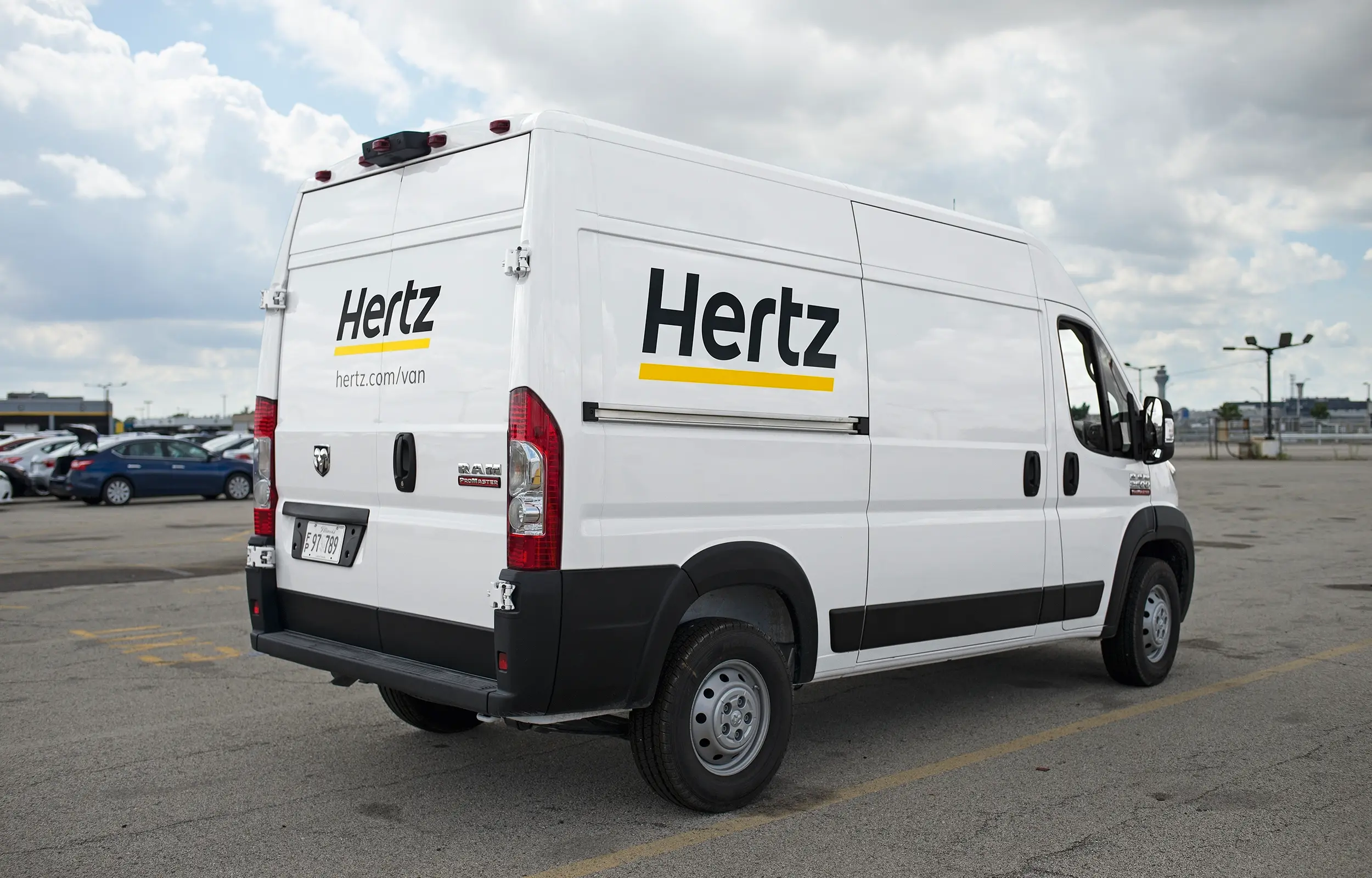 White Hertz cargo van graphics