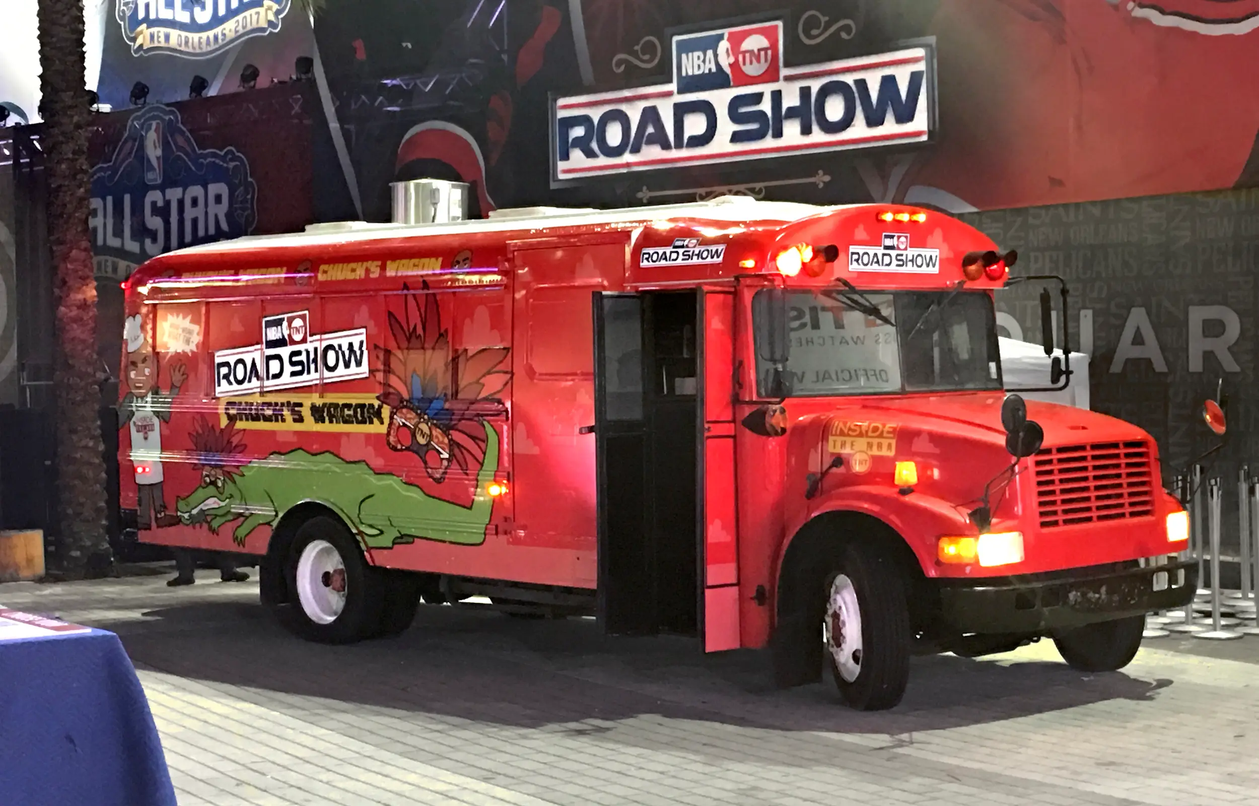 Red road show bus wrap at an All-Star event