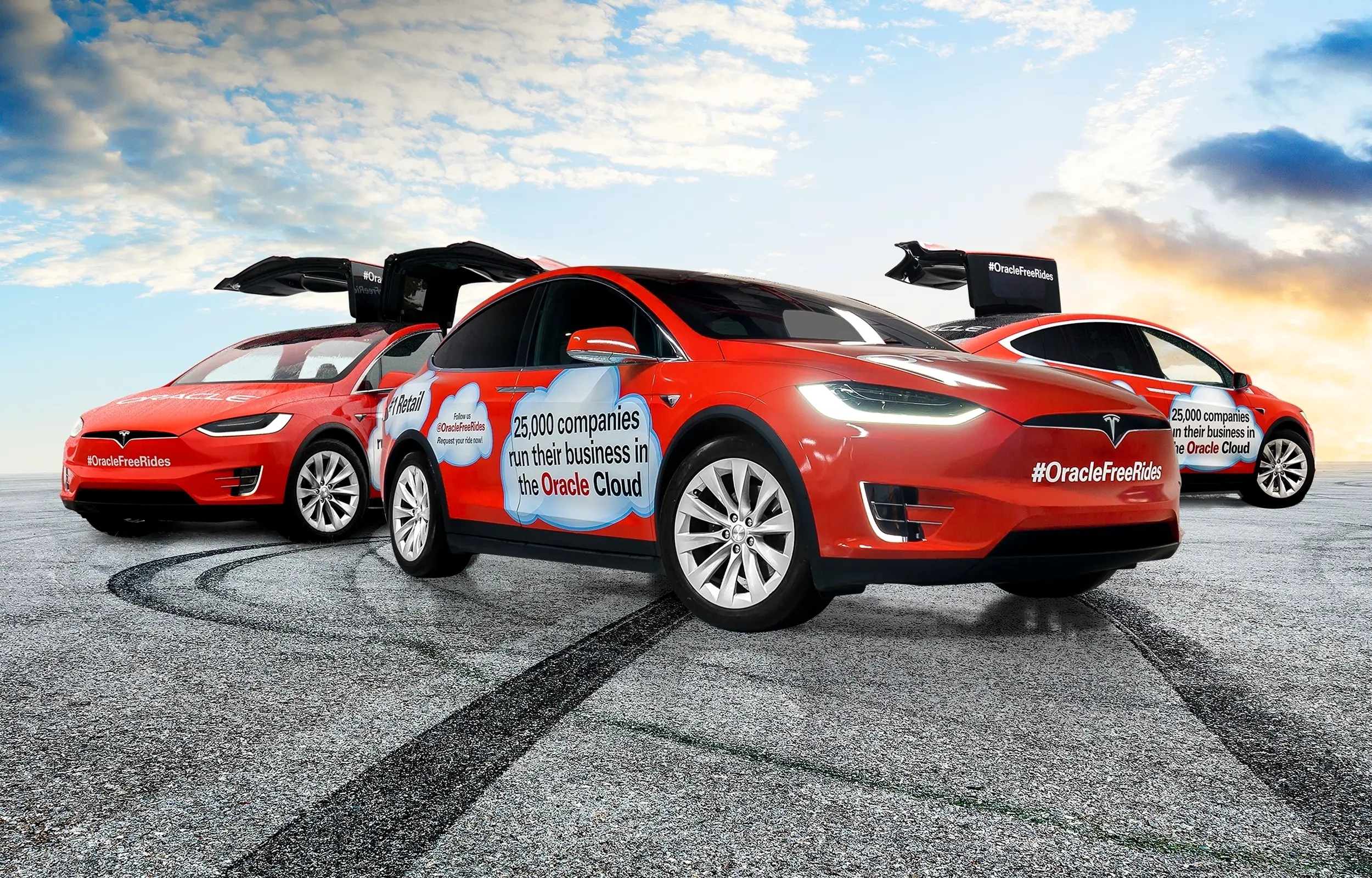Tesla Model X fleet with red promotional wraps