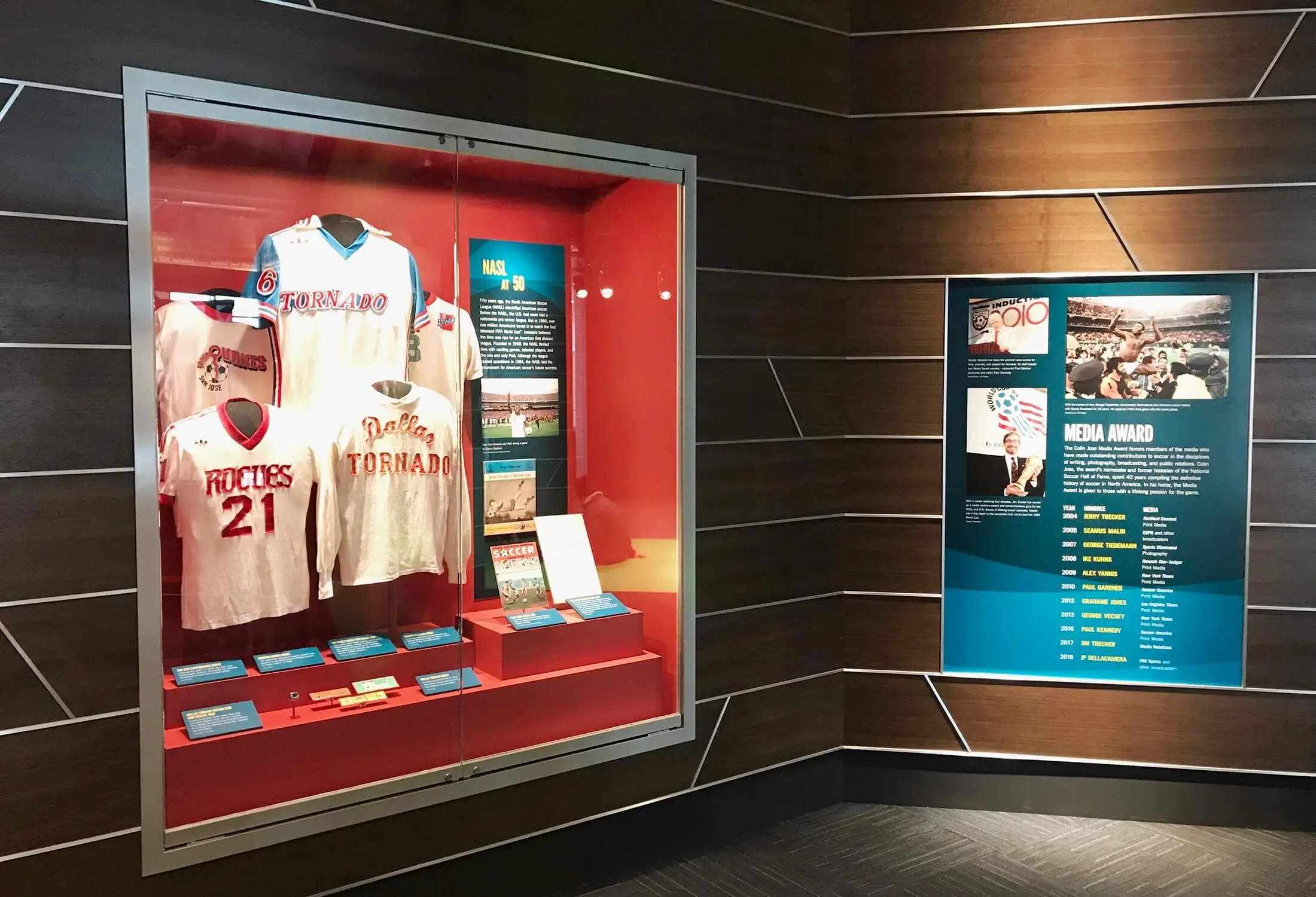 Jersey exhibit case with red backing panels