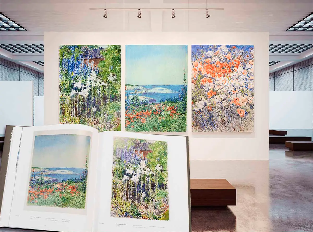 Floral and landscape paintings with a matching art book spread