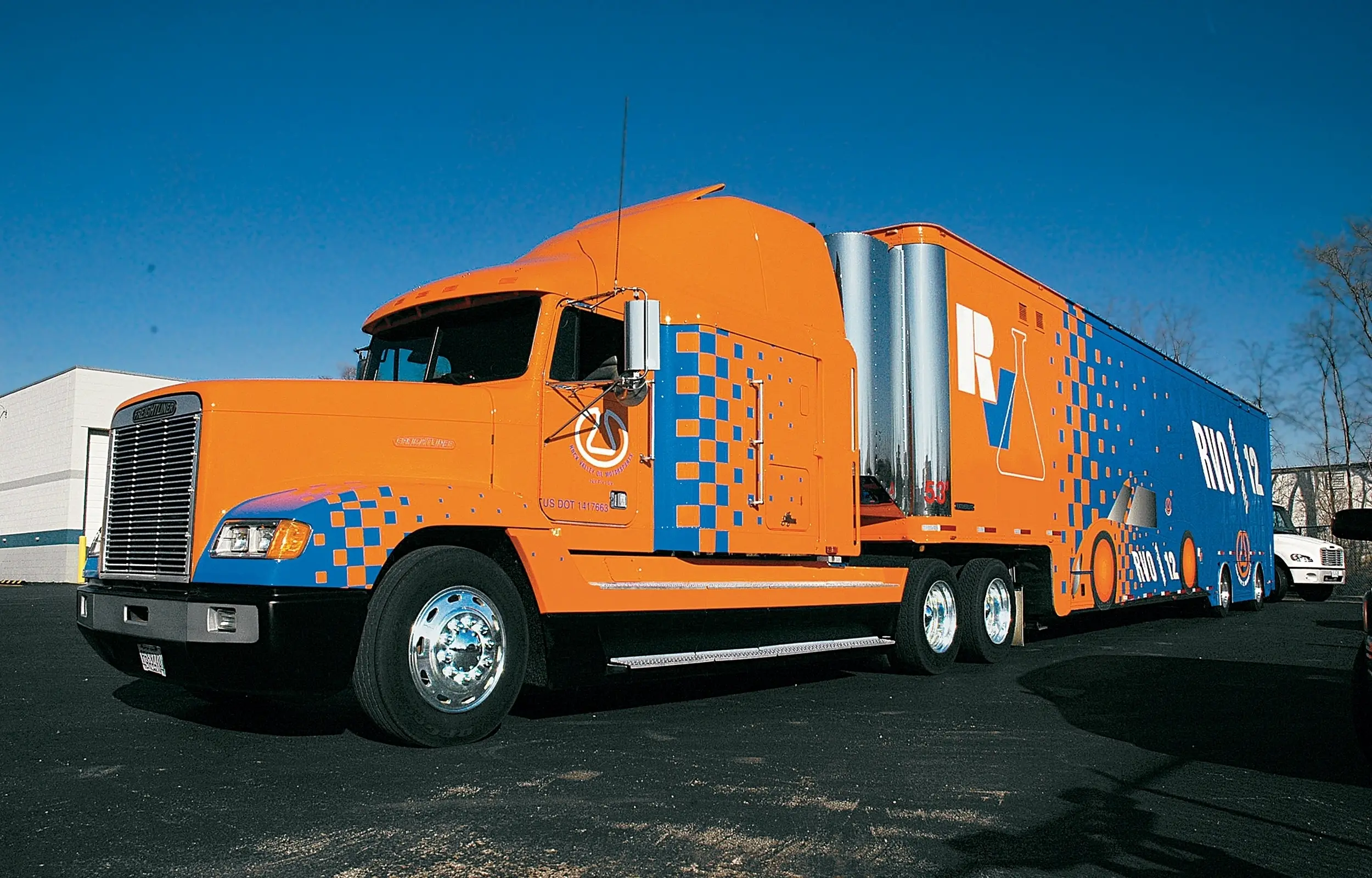 Semi tractor-trailer with full graphics, ready for the road